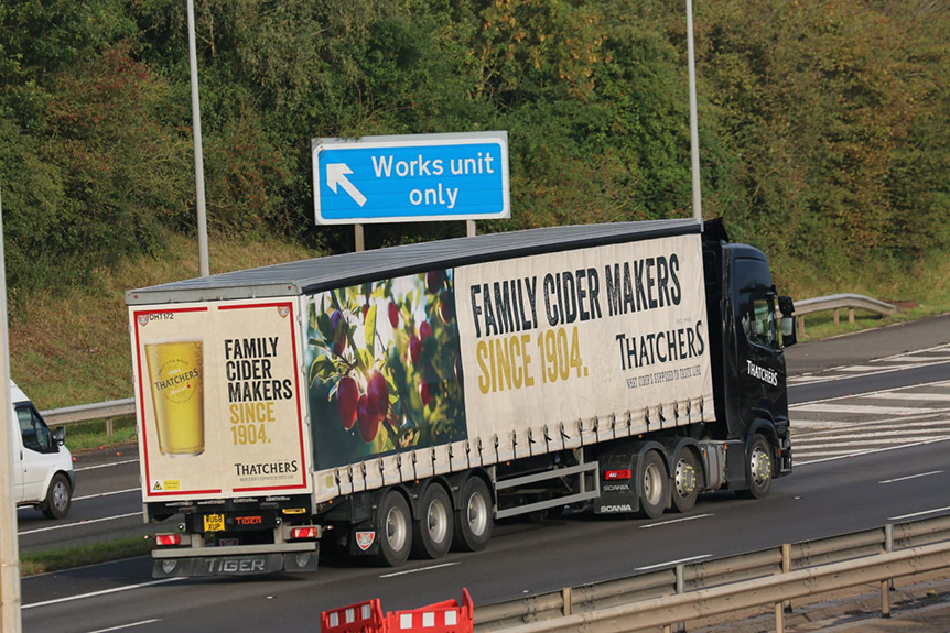 Thatchers-Cider-curtainsided-trailer-with-rear-strap-suppression-flap-Tiger-Tim-Pickford