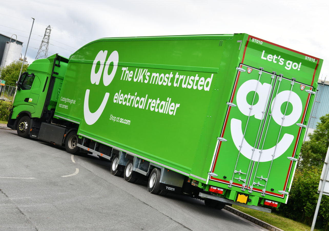 AO electricals retailer FMCG invests £2m moving double deck LST Tiger Trailers, CNG IVECO trucks 1